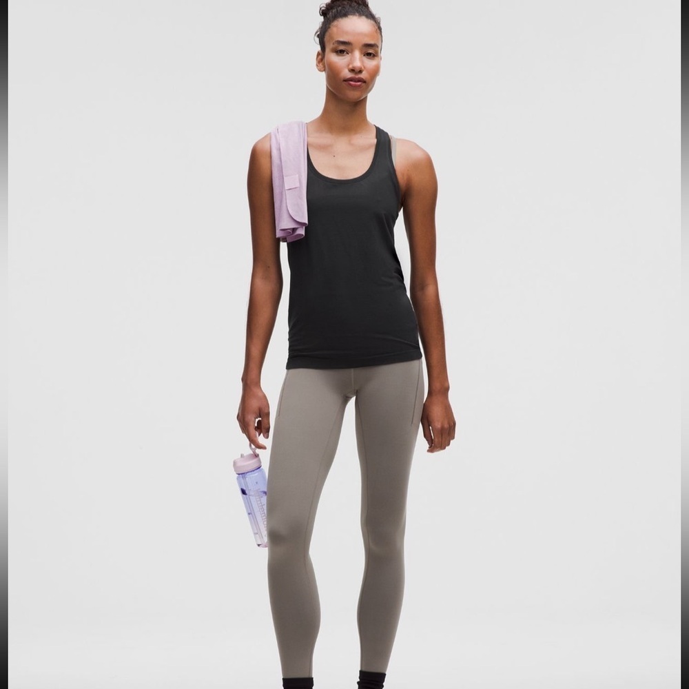 - Lululemon Swiftly Tech tank top Racerback Tank black with white logo size 2/4